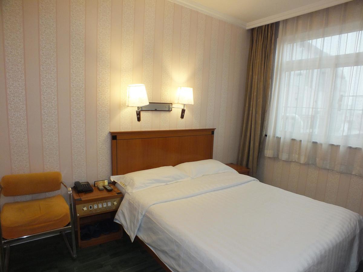 Beijing Fuxing Holiday Hotel Zimmer foto